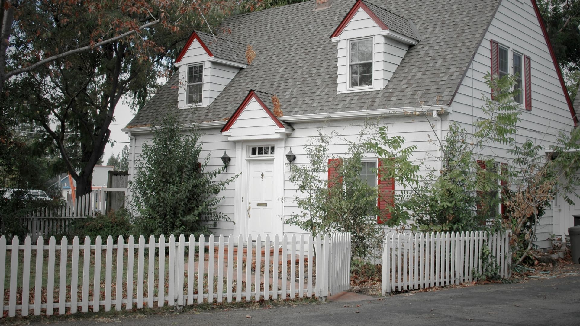 The Dead Man Behind the White Picket Fence